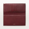 International Wallet mit Seitenfalten, Must de Cartier – Schwarzes Kalbsleder, Edelstahl-Finish – Cartier