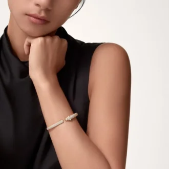 Panthere de Cartier Armband, kleines Modell, halb mit Diamanten besetzt