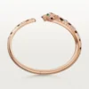 Panthere De Cartier Armband, mittleres Modell, halb pavé-besetzt