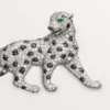 Panthere De Cartier Brosche – Weißgold, Smaragde, Onyx, Diamanten – Cartier
